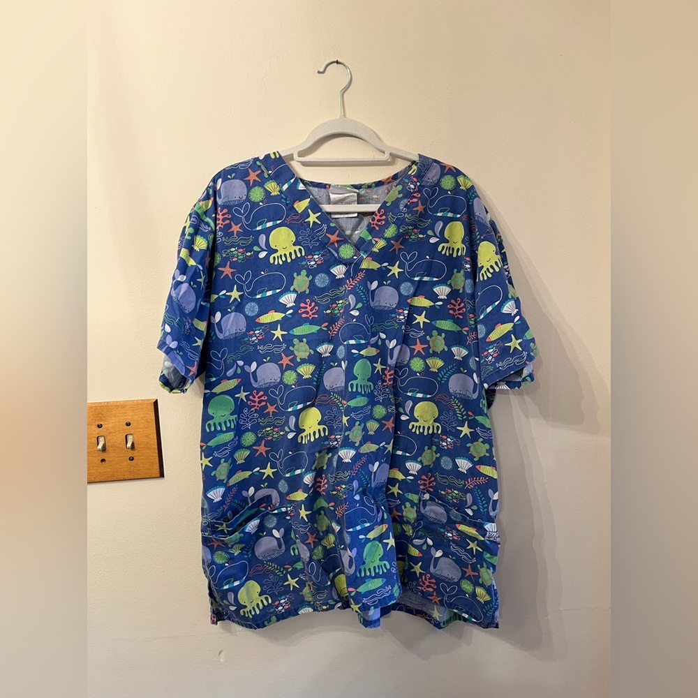 UA scrubs top